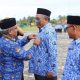 Pj Bupati Serahkan Satyalancana di HUT Korpri Aceh Utara