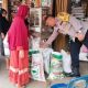 Sambangi Pedagang Beras Bhabinkamtibmas Polsek Peureulak Polres Aceh Timur Sampaikan Pesan Kamtibmas