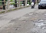 Kondisi Jalan di Jembatan Guhang Cot Mane Memprihatinkan